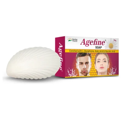 Agefine Soap is a premium skincare product infused with L-Glutathione, Kojic Acid, Glycolic Acid, and Vitamin C – a powerful combination of antioxidants and exfoliants. Ideal for hyperpigmentation, dull skin, and uneven skin tone, this soap promotes a healthy, youthful glow while gently exfoliating dead skin cells.

🔬 Key Ingredients and Benefits
L-Glutathione: A master antioxidant that reduces melanin production and lightens skin tone.

Kojic Acid: Fades age spots, sun damage, and acne scars.

Glycolic Acid: Exfoliates the skin and promotes new cell turnover.

Vitamin C: Boosts collagen, fades dark spots, and brightens skin.

💡 Usage Instructions
Wet skin with water.

Gently apply the soap and lather.

Leave on for 1–2 minutes for deep cleansing.

Rinse thoroughly and pat dry.

Use twice daily for visible results.

✅ Benefits
Reduces hyperpigmentation and dark spots

Brightens and evens skin tone

Gently exfoliates for smoother skin

Boosts antioxidant defense

Suitable for all skin types

🔗 Internal Links
Explore More Glutathione Skincare Products

Top Brightening Soaps You Must Try

🌐 External Links
Glutathione & Skin Brightening – PubMed Study

How Kojic Acid Works – Healthline

🙋 Frequently Asked Questions (FAQs)
Q1. Is Agefine Soap safe for daily use?
Yes, it is dermatologically tested and safe for everyday use.

Q2. Does it work on acne marks?
Yes, ingredients like Kojic Acid and Glycolic Acid help fade acne scars.

Q3. Can both men and women use it?
Absolutely. It is suitable for all genders.

Q4. Is this soap suitable for oily skin?
Yes, it helps regulate oil and clears pores.

Q5. How long before I see results?
Visible improvement may be seen in 2–4 weeks with regular use.
